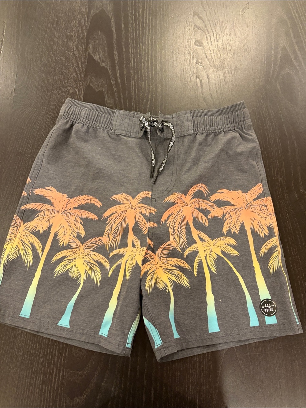 Boys Gray Palm-Print Swim Trunks with Orange and Teal Palms